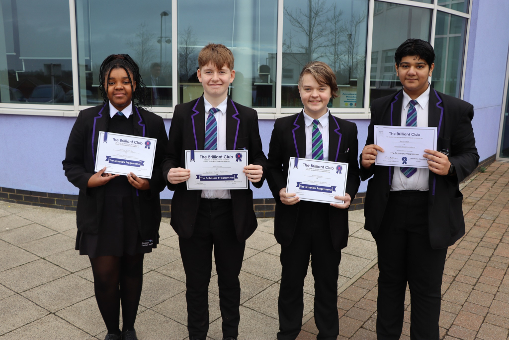 Students pose with awards