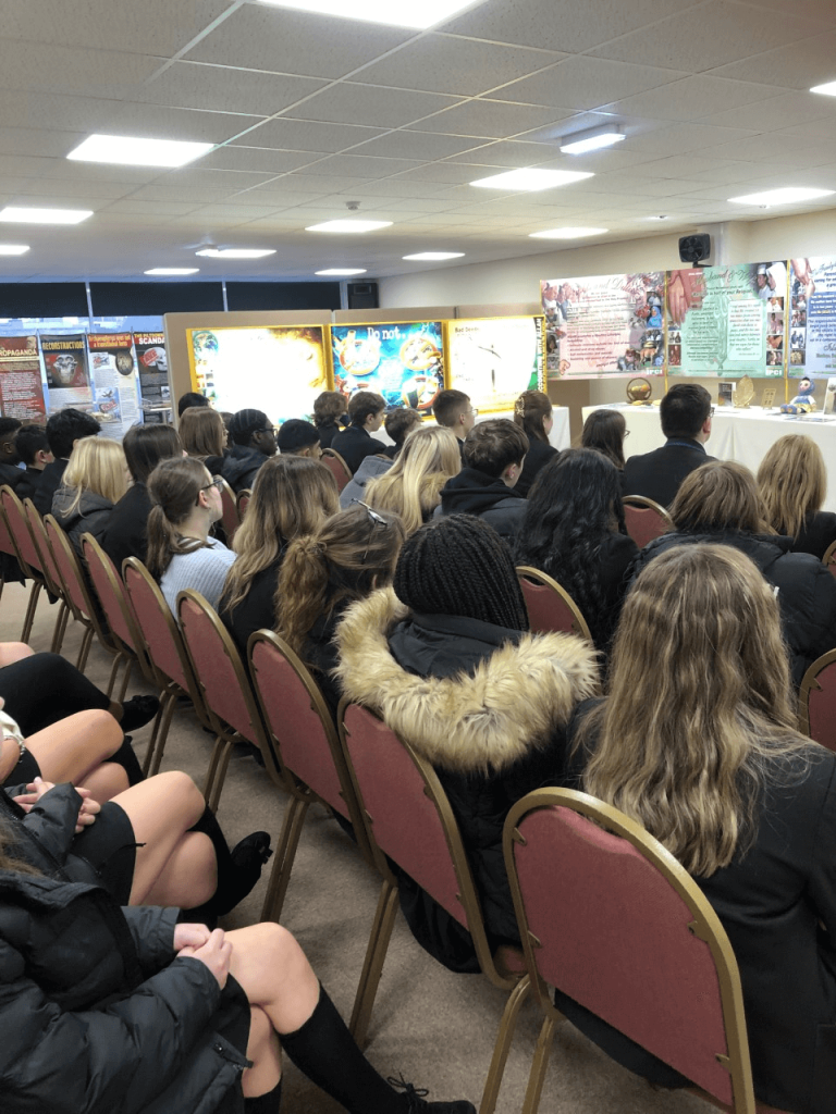 students sat down at a talk