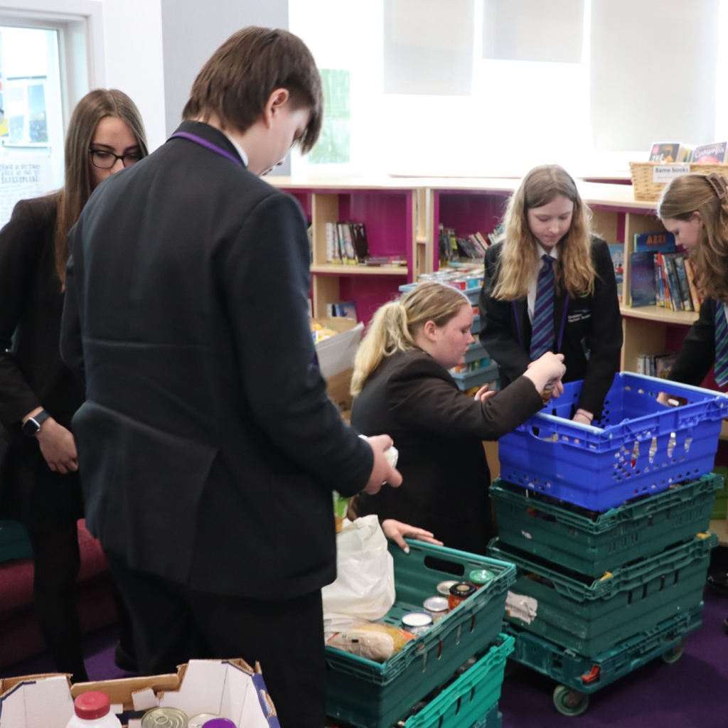 students collecting food donations