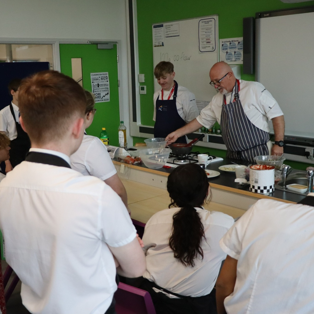 students watching cooking