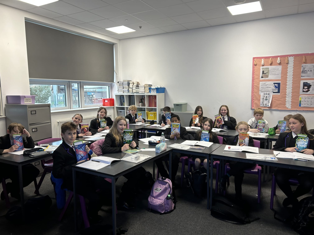 group shot of students in the library