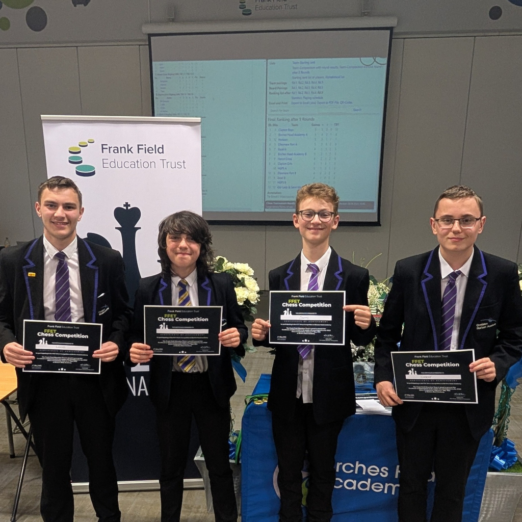 students with certificates at chess tournament