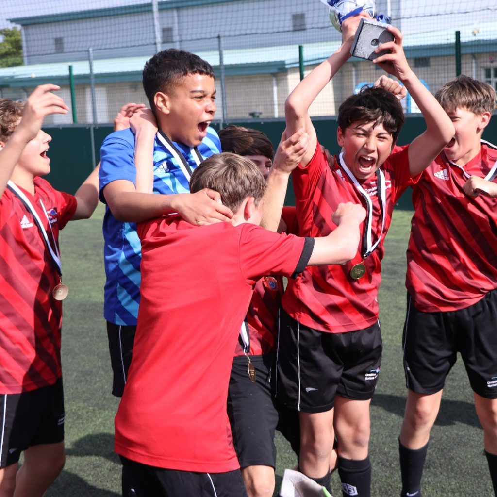 students at football tournament