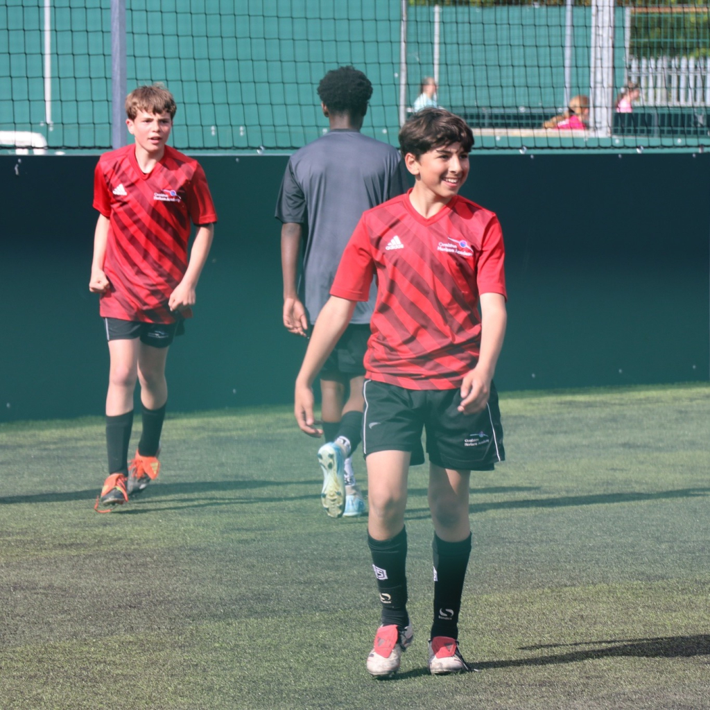 students at football tournament