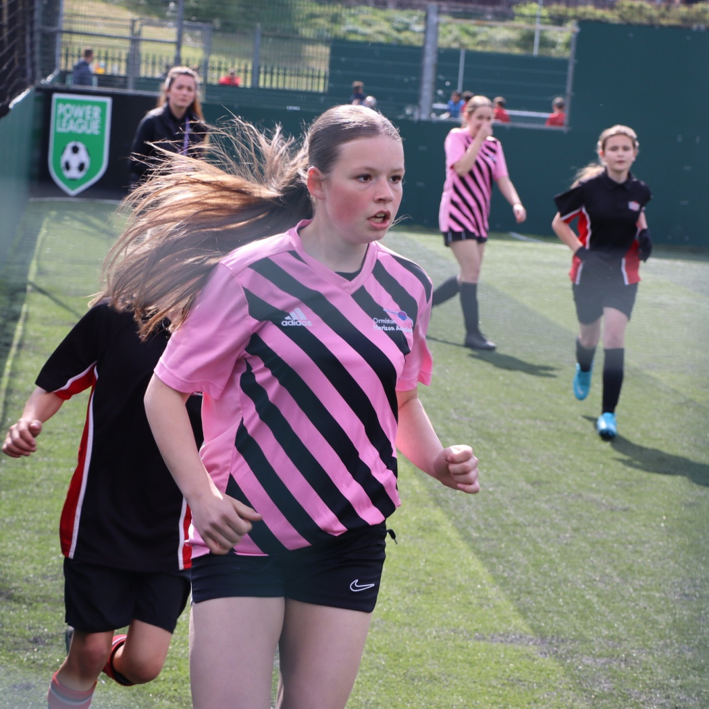 students at football tournament