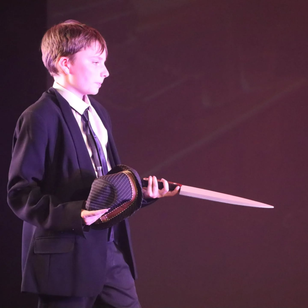 Students performing in annie production