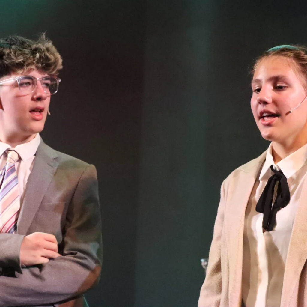 Students performing in annie production