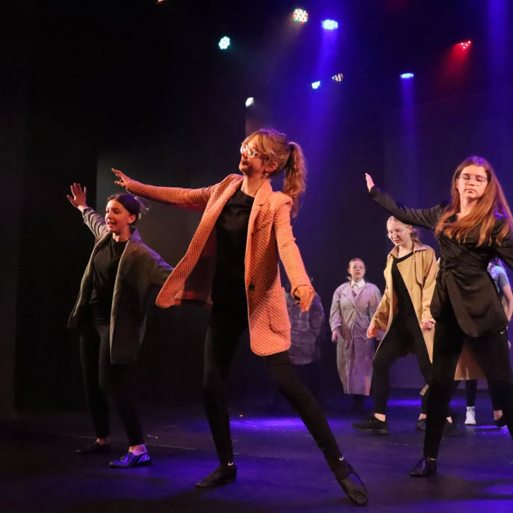 Students performing in annie production