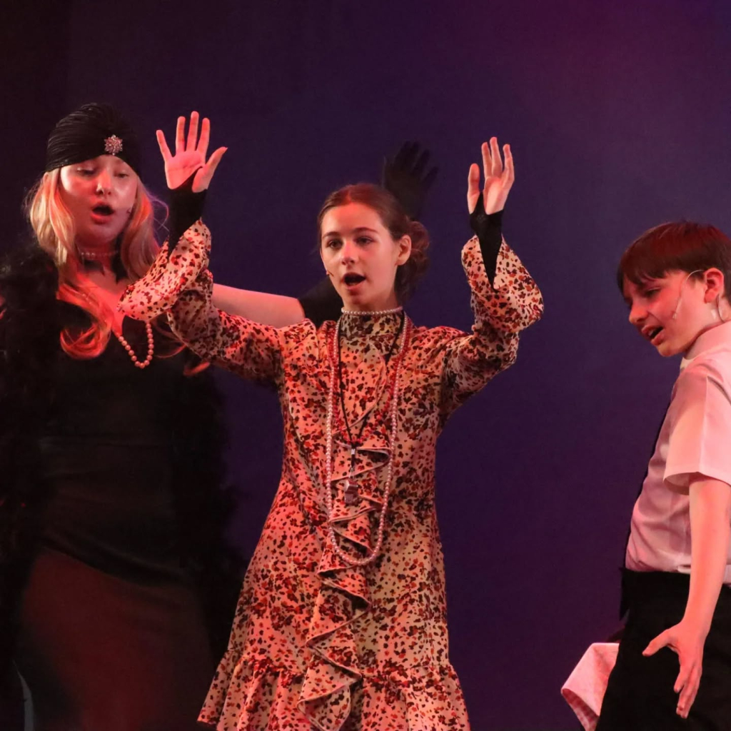 Students performing in annie production
