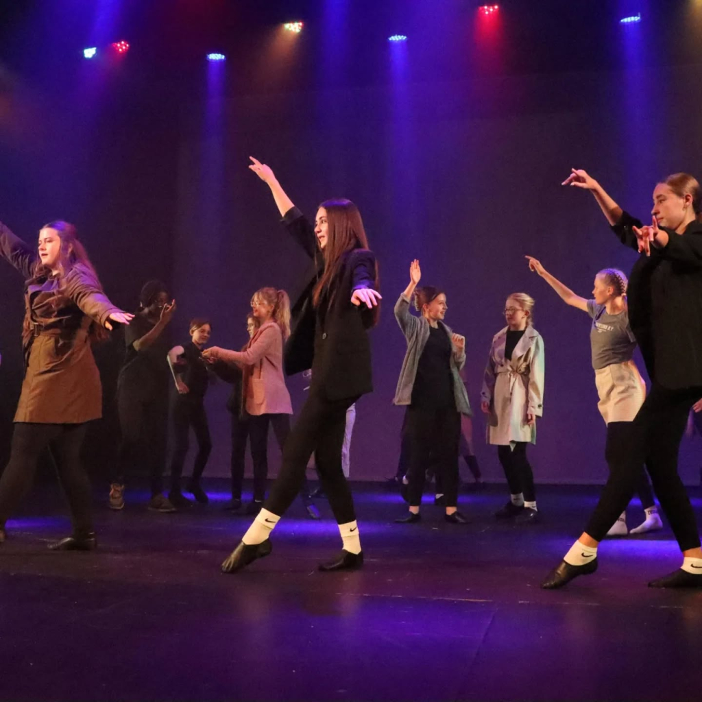 Students performing in annie production