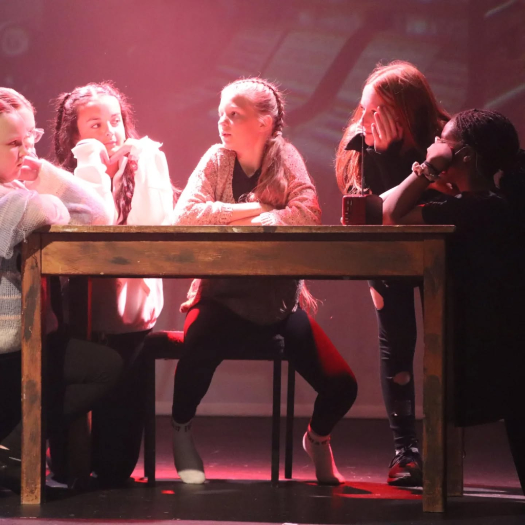 Students performing in annie production