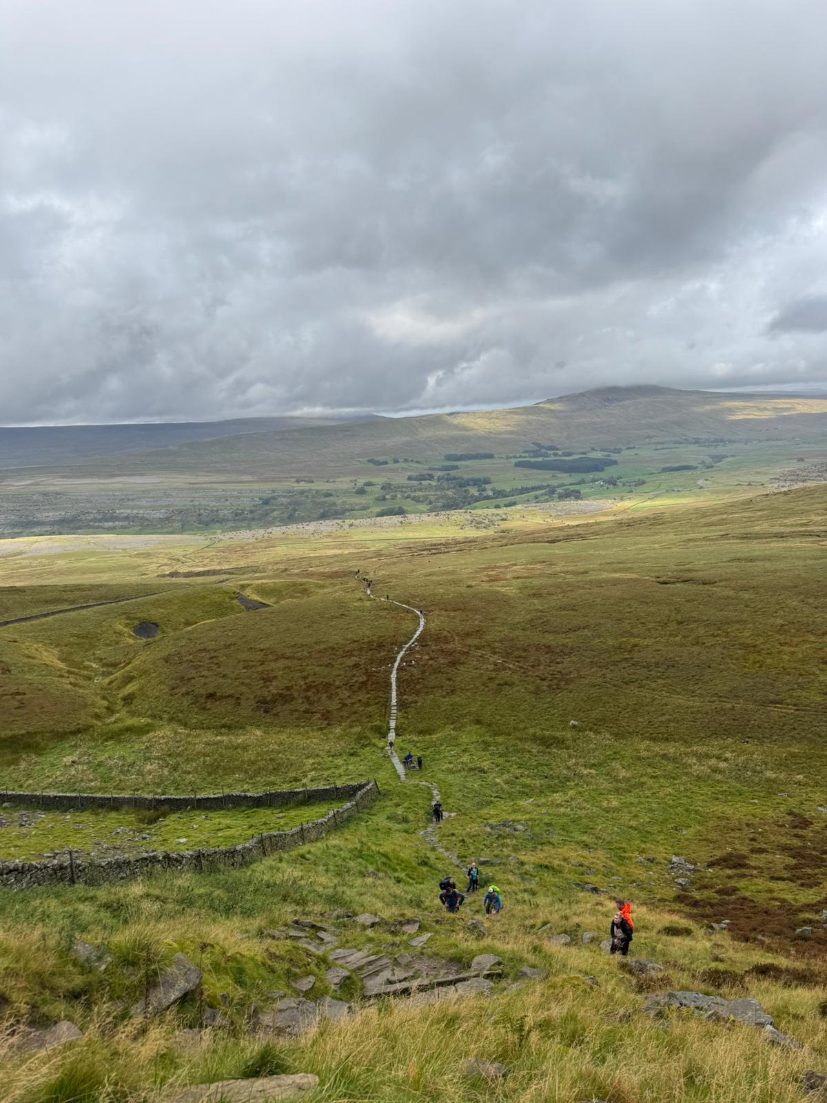 Staff complete peaks challenge