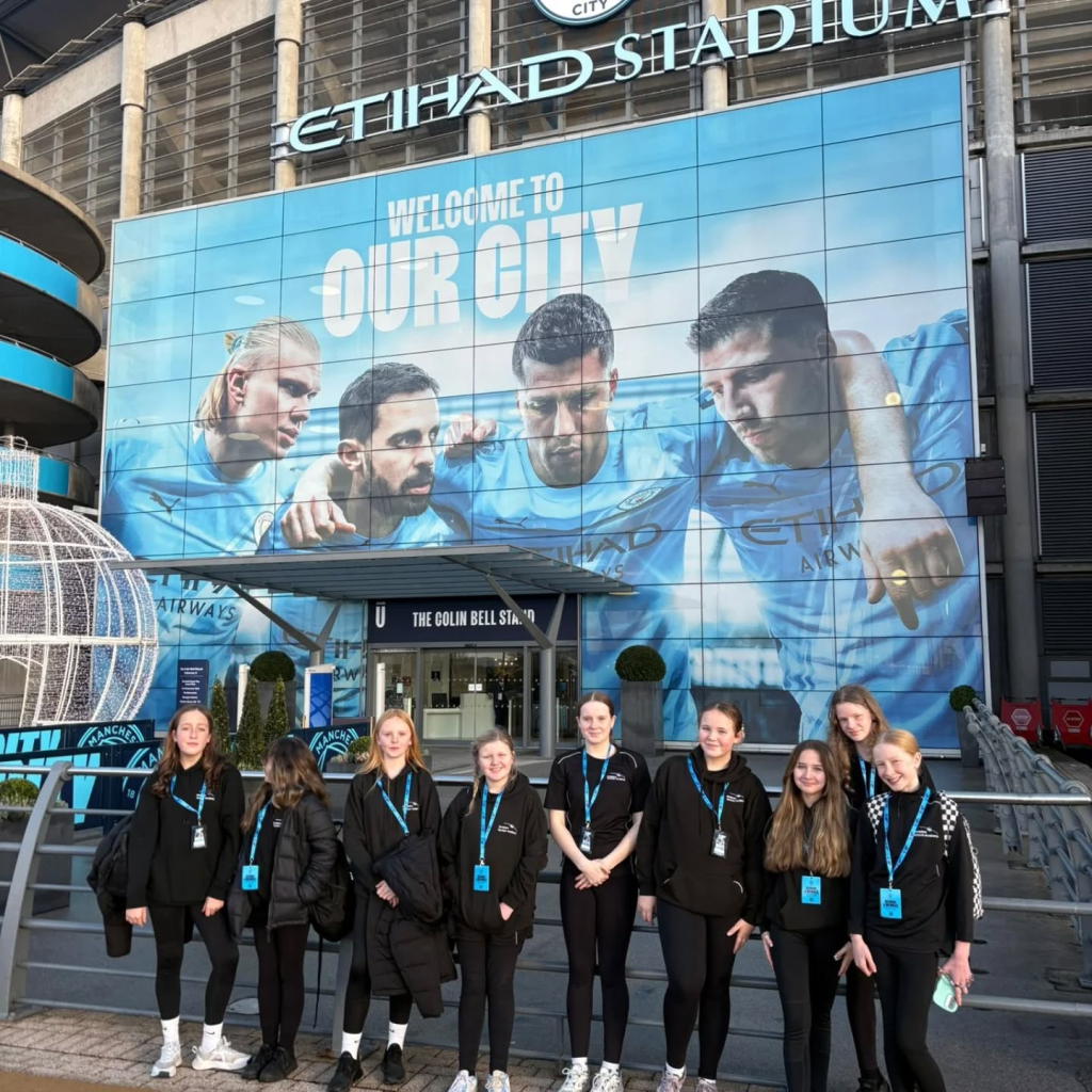 students at etihad stadium