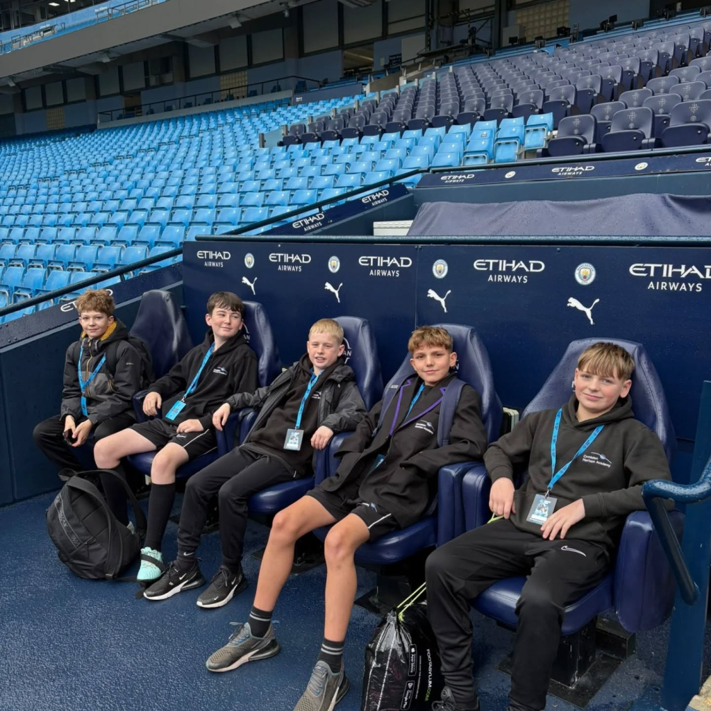 students at etihad stadium