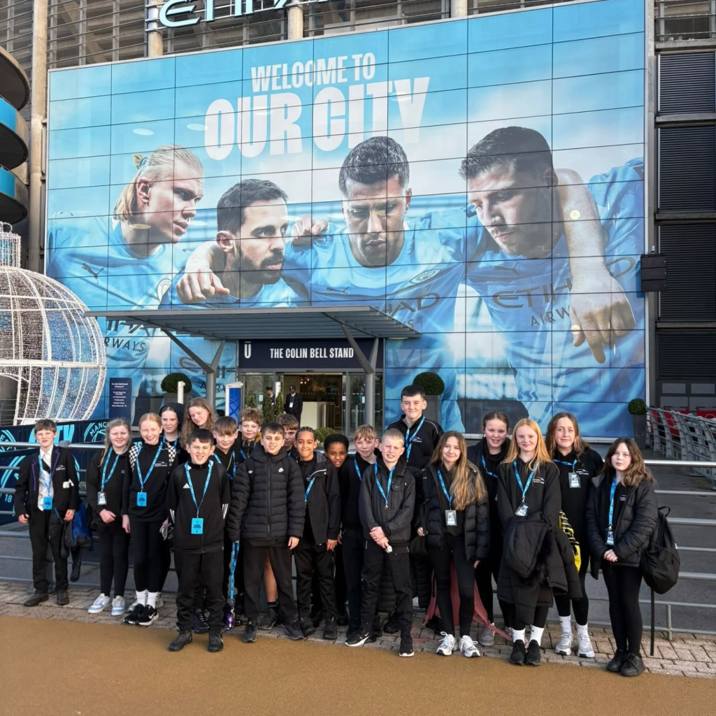 students at etihad stadium
