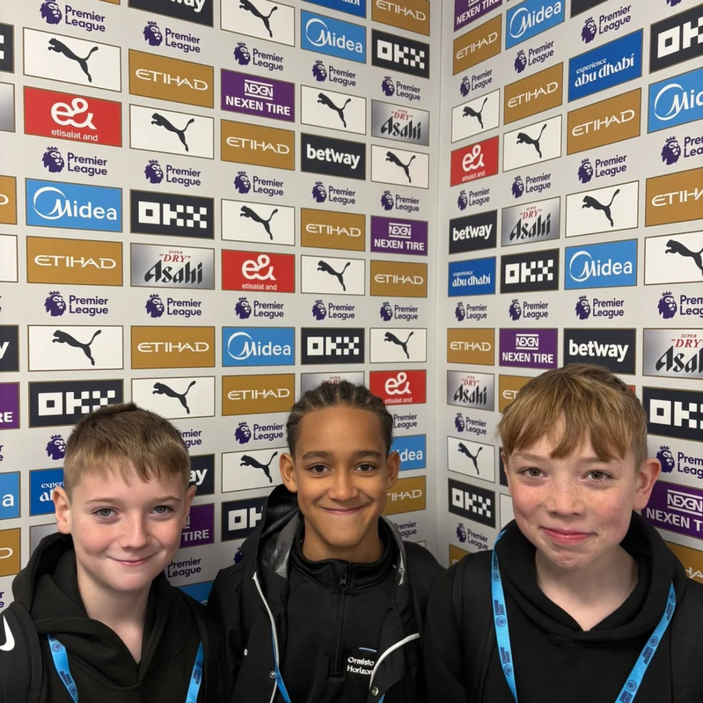 students at etihad stadium