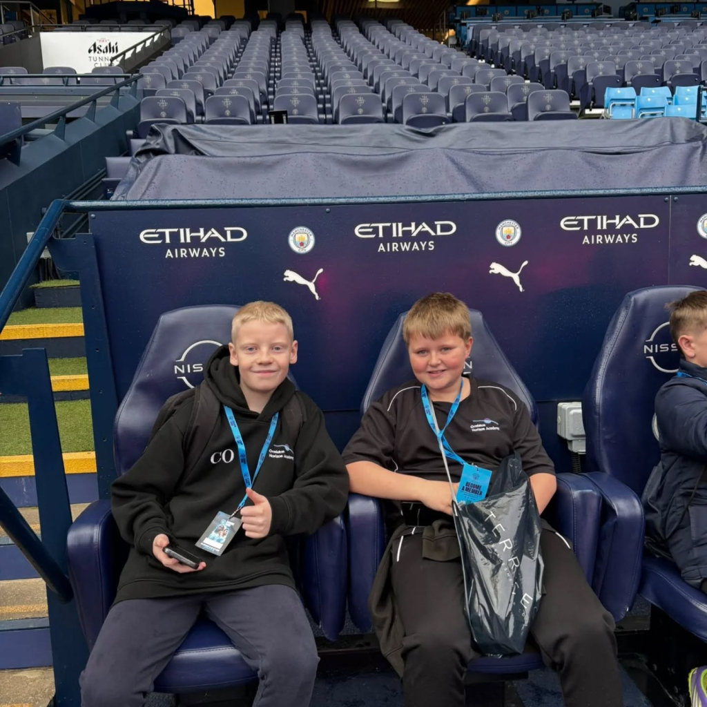 students at etihad stadium