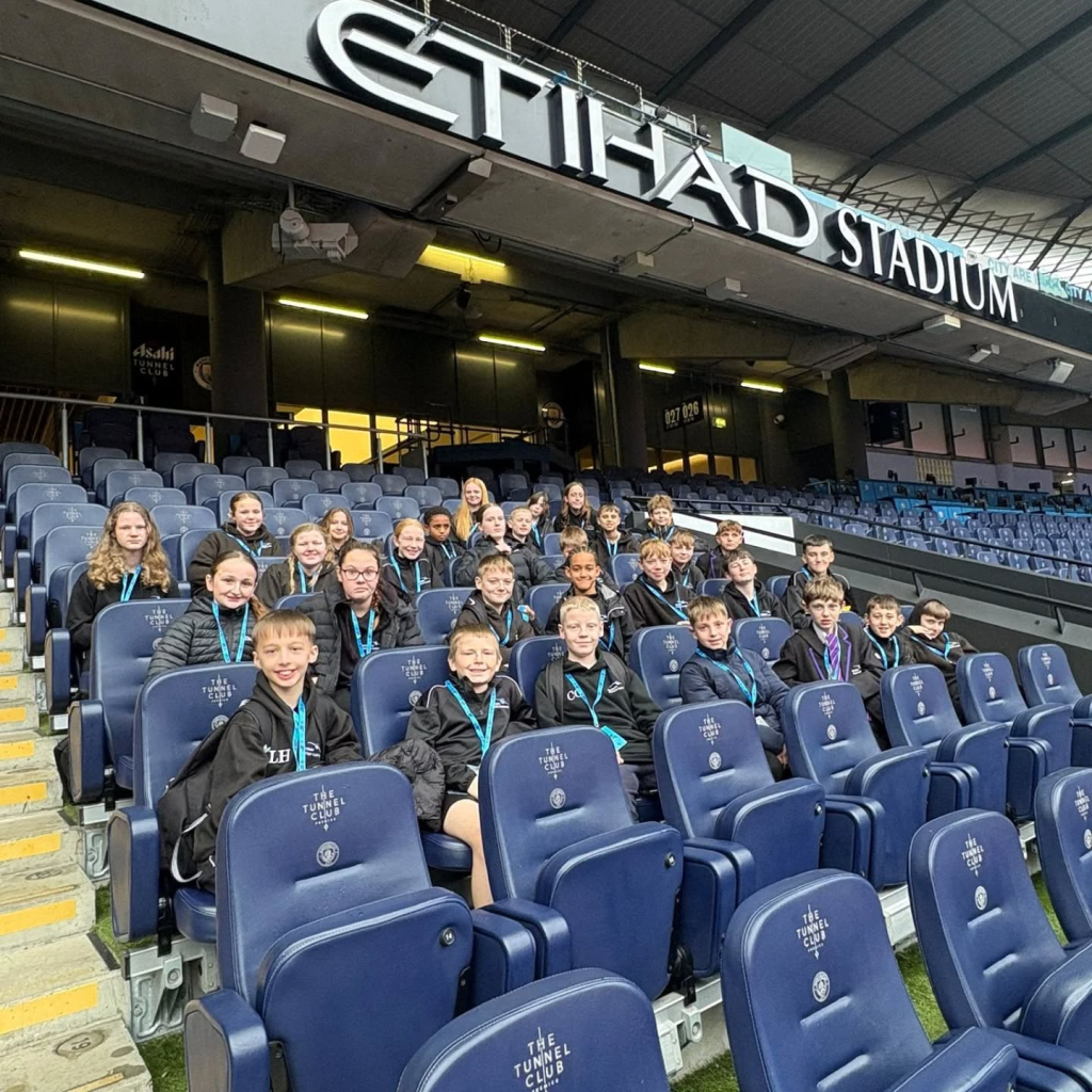 students at etihad stadium
