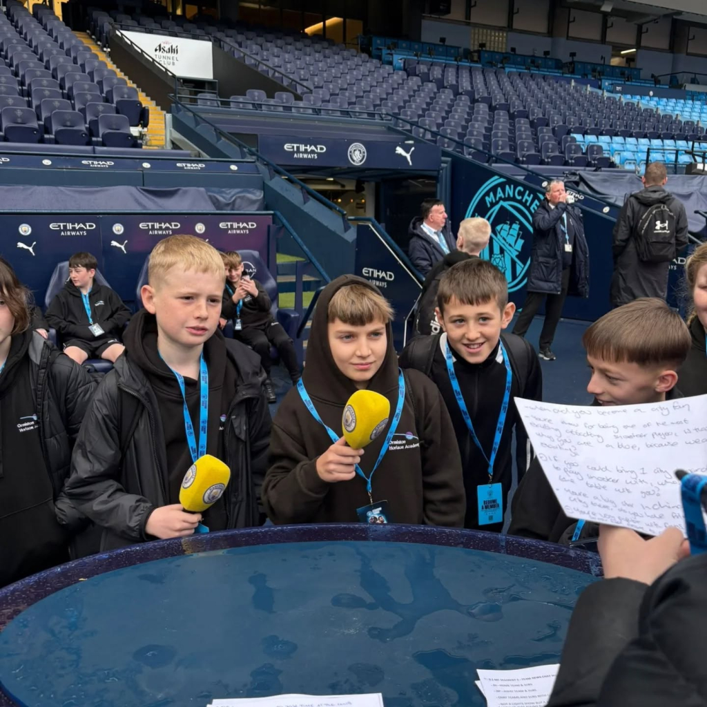 students at etihad stadium