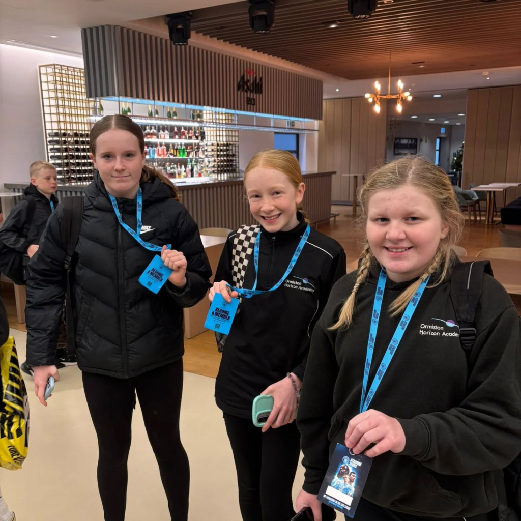 students at etihad stadium