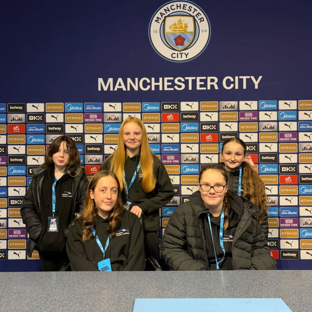 students at etihad stadium