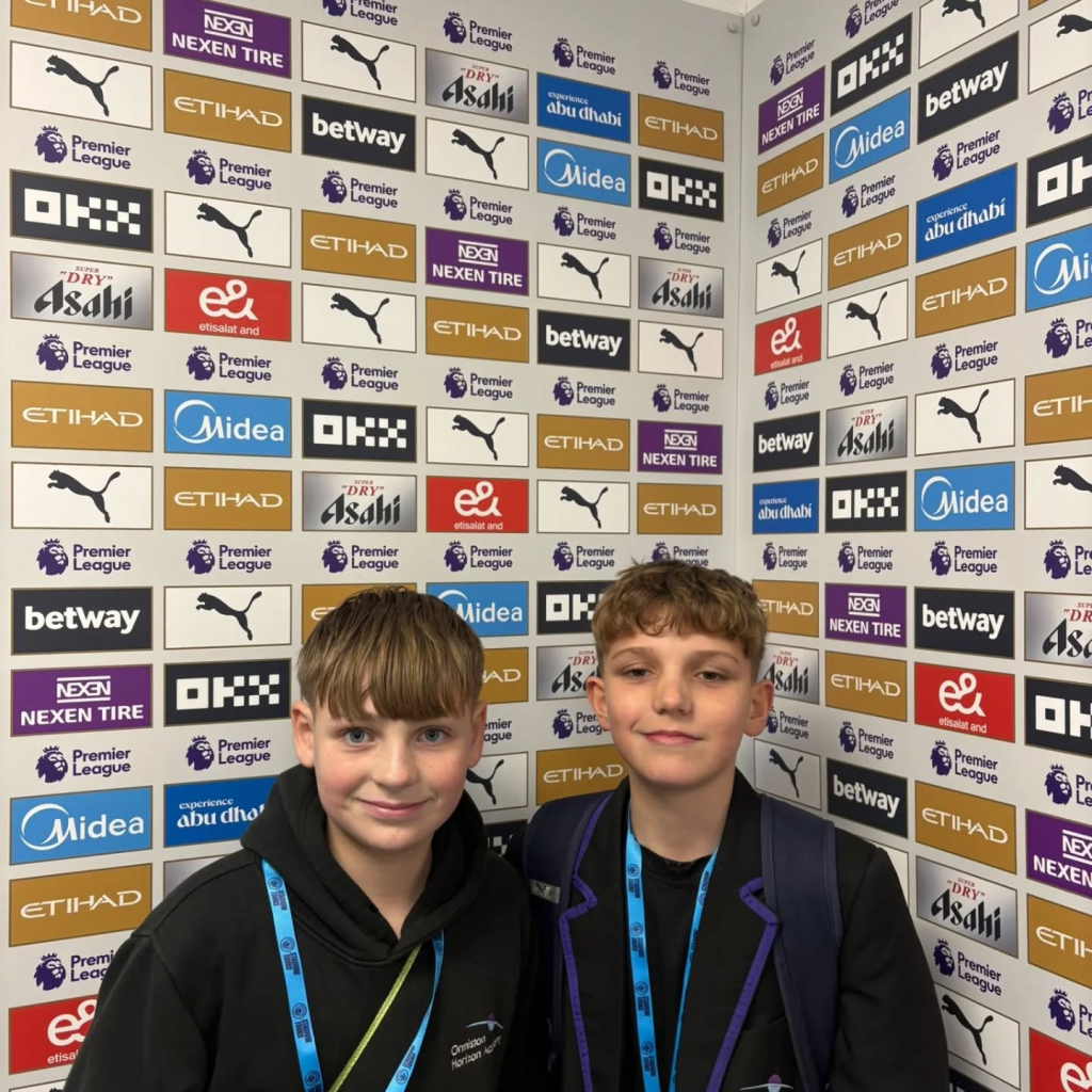 students at etihad stadium